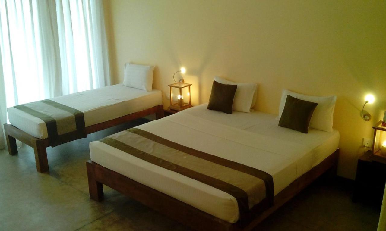 Giman Free Beach Resort Passikudah Exteriör bild
