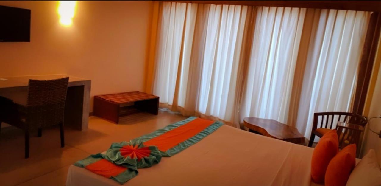 Giman Free Beach Resort Passikudah Exteriör bild