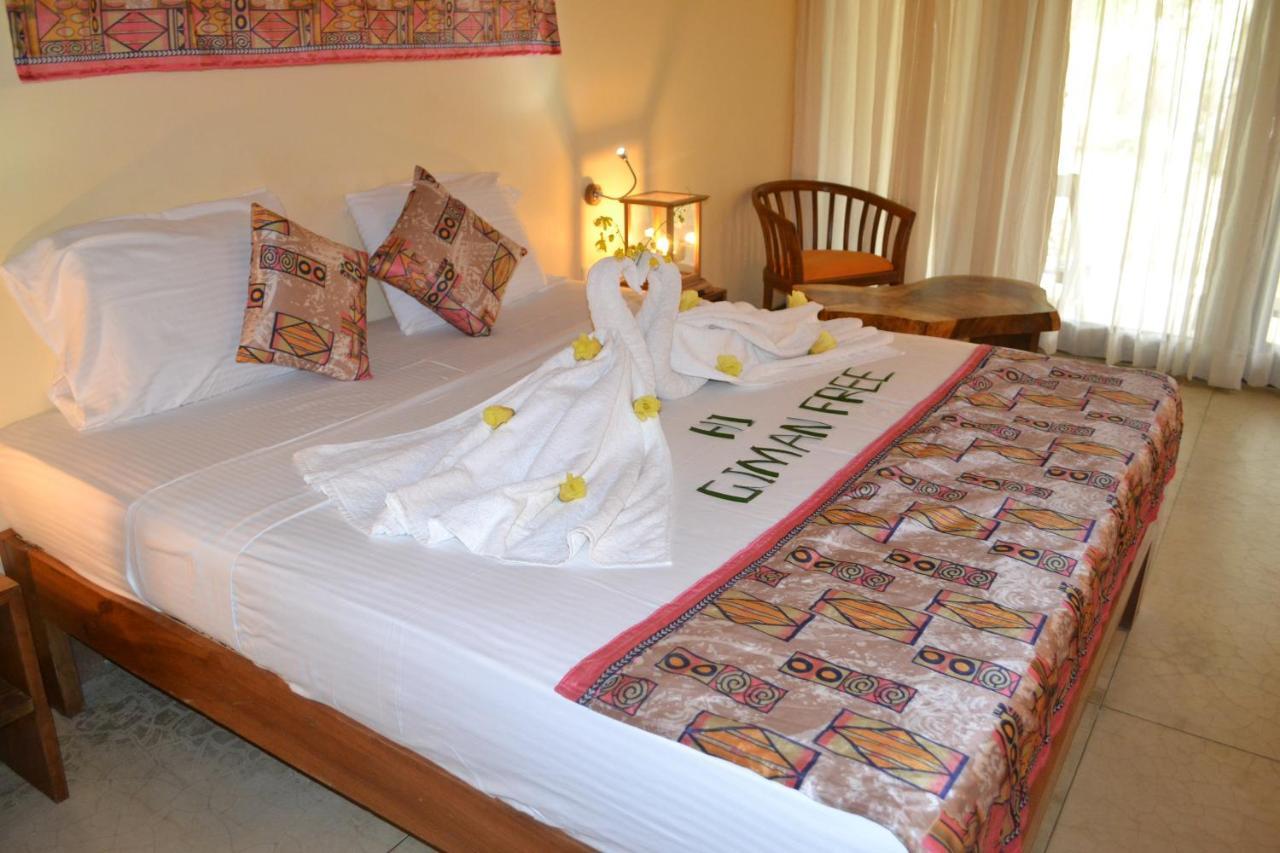 Giman Free Beach Resort Passikudah Exteriör bild